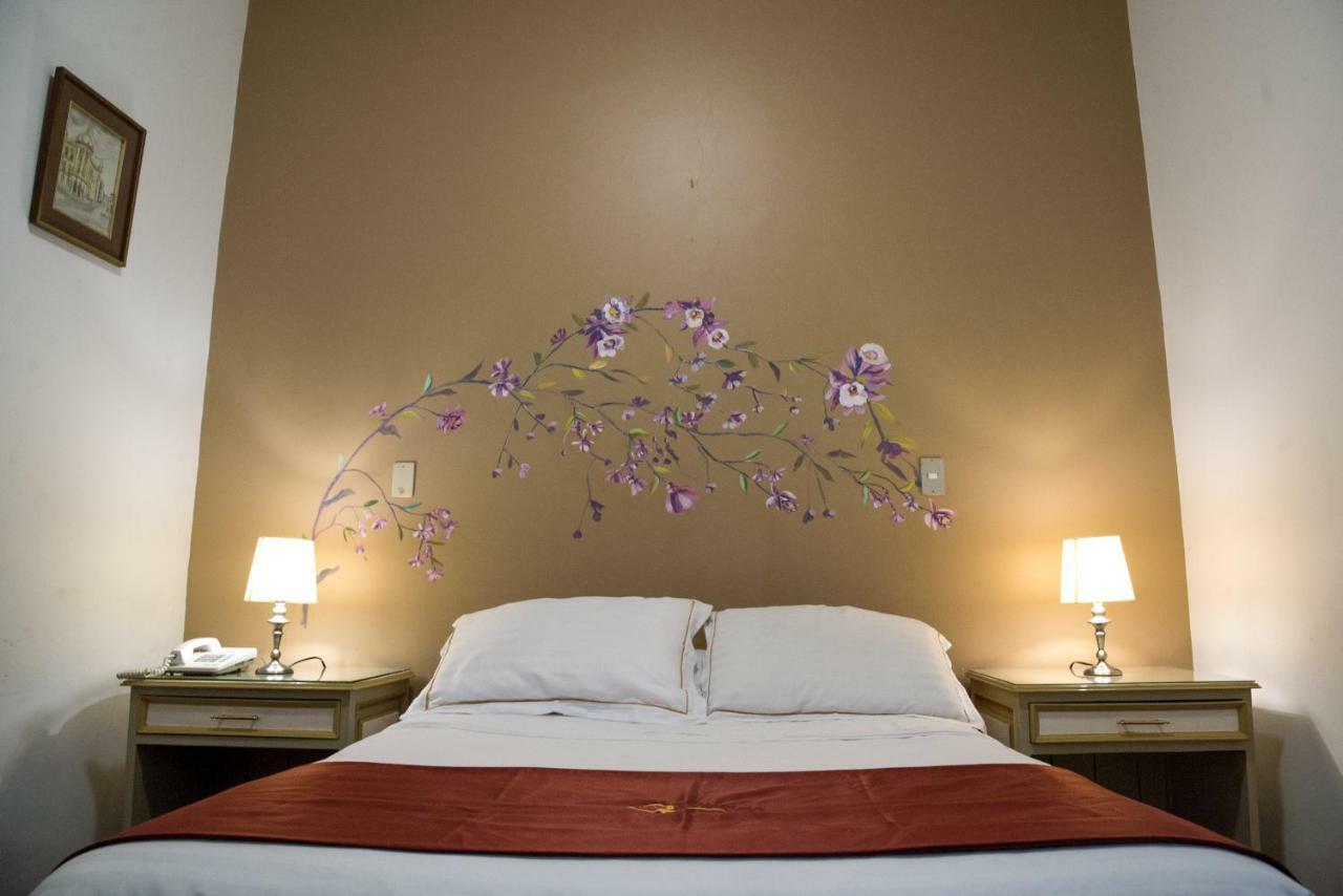 Hotel La Orquidea Куенка Номер фото